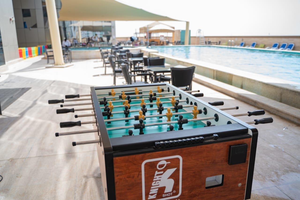 Luxe Grand Hotel Apartments Sharjah Luaran gambar A foosball table