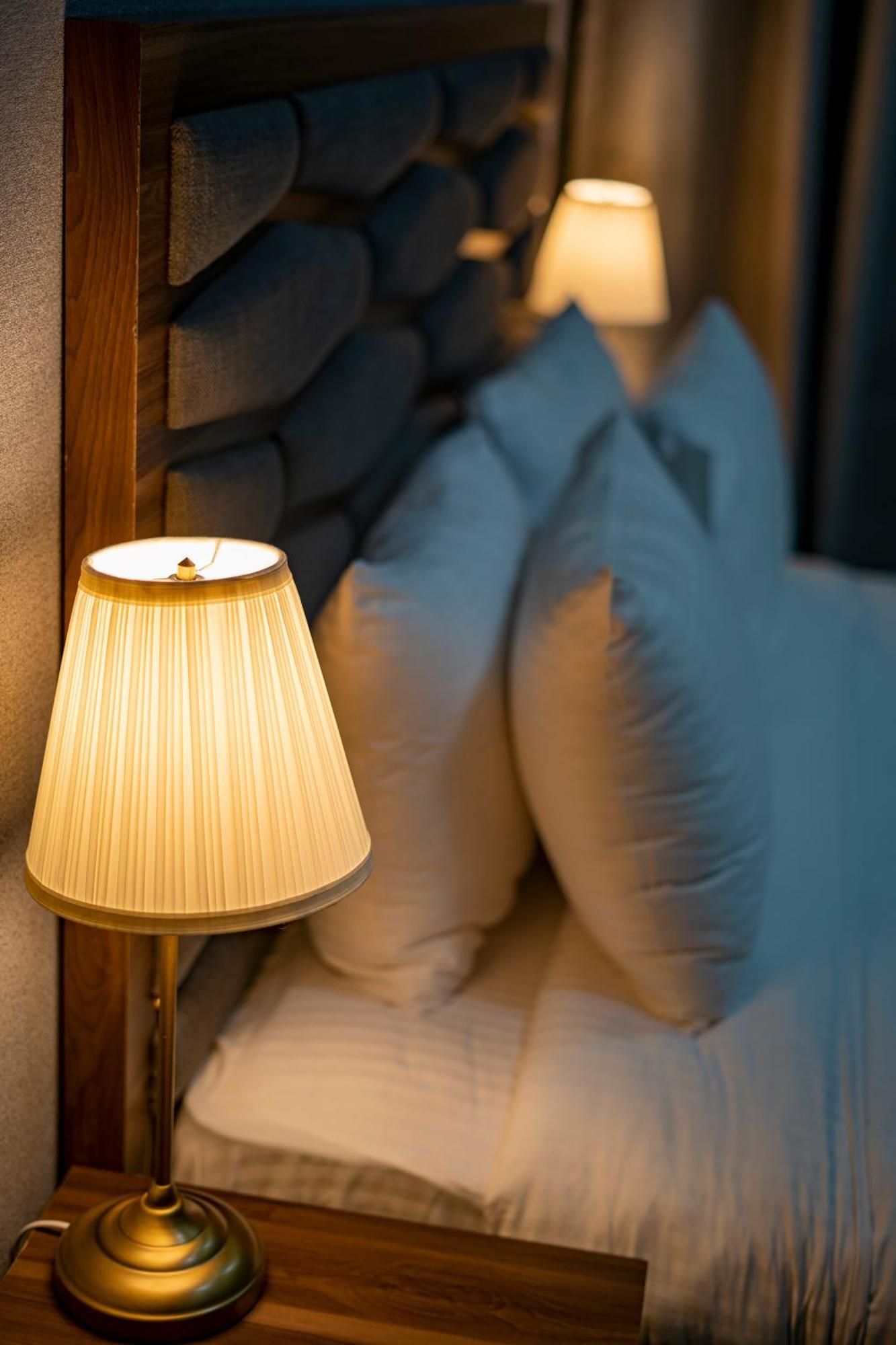 Luxe Grand Hotel Apartments Sharjah Luaran gambar A pleated lampshade